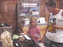 Summer and Diana looking at exhibit